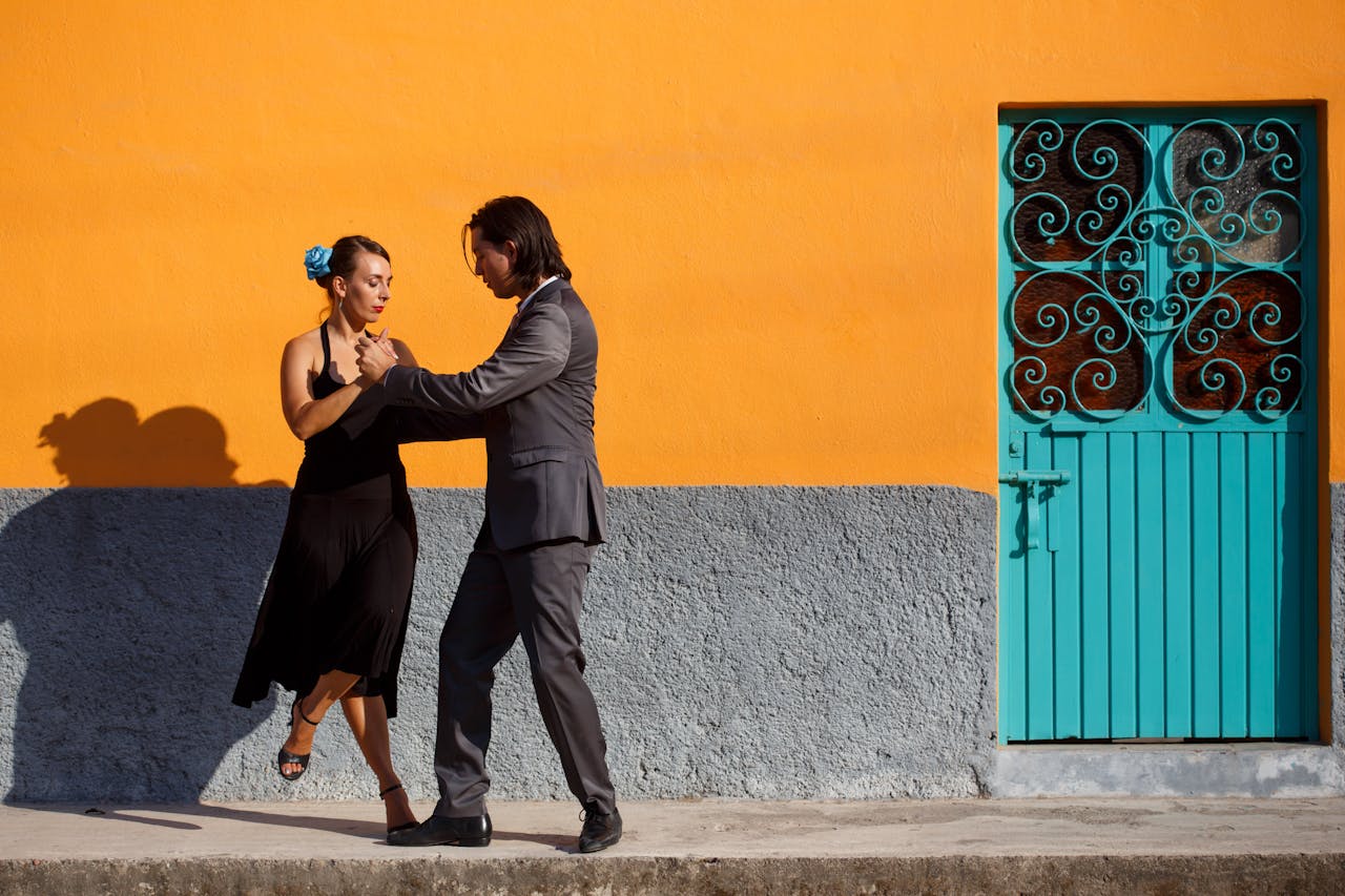 Man and Woman Dancing on the Sidewalk